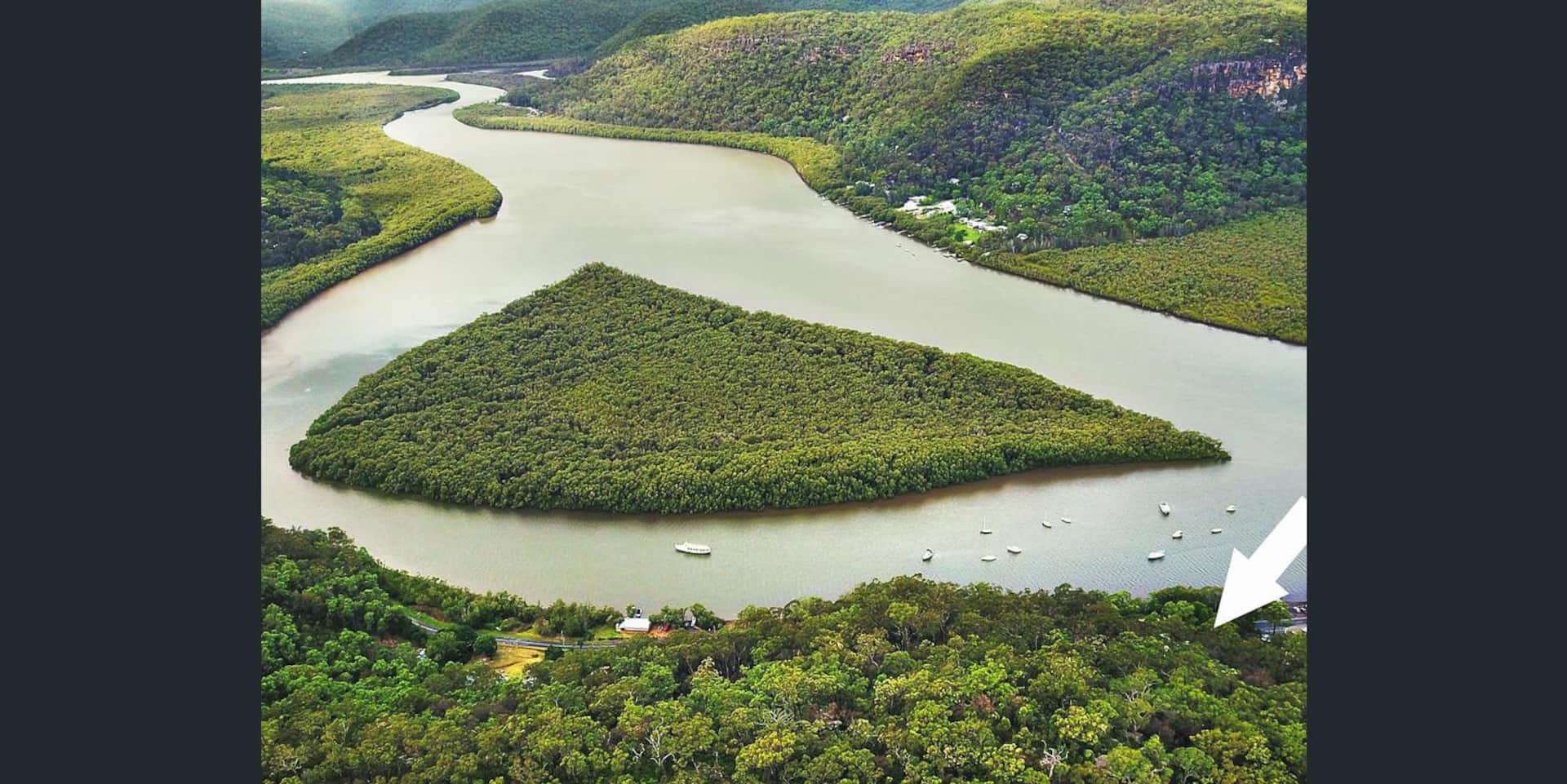 Aerial view of The Bush Retreat overlooking the Hawkesbury River at golden hour